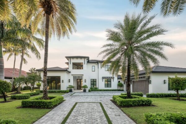 Majestic Isles front of the home during sunset.